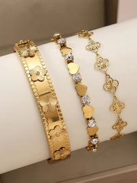8K Gold Plated Bracelet Set of 3 | Flower Bangle, Heart & CZ Tennis Chain, Clover Link Bracelet | Women's Stackable Jewelry | JC Sunshine