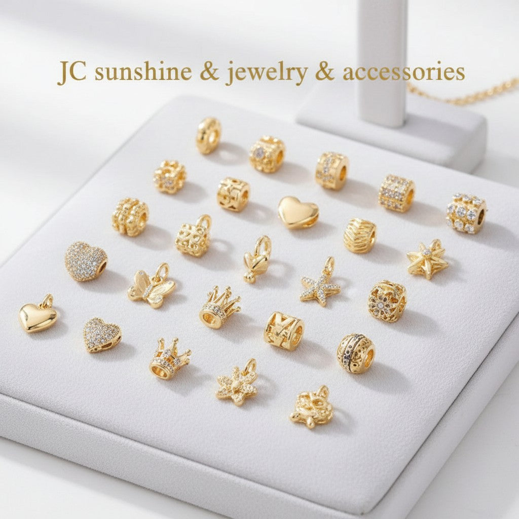Collection of gold-tone charms and beads for bracelets, featuring hearts, stars, flowers, animals, and letters.