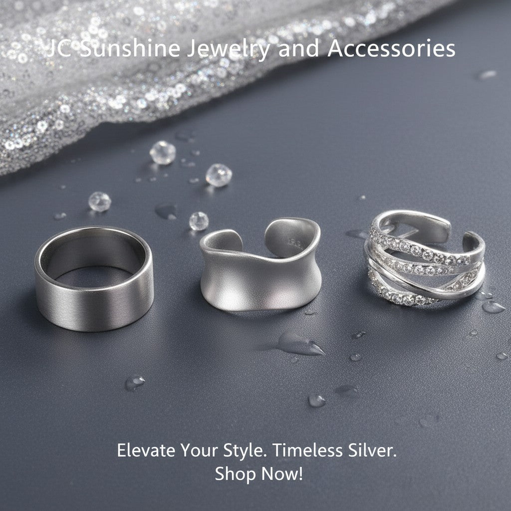 JC Sunshine Jewelry and Accessories three sterling silver rings: wide band, curved wrap, and layered band with cutouts.